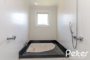 Casa em Condomínio à venda com 240m², 3 dormitórios, 3 suítes, 2 vagas, no bairro Alphaville em PORTO ALEGRE