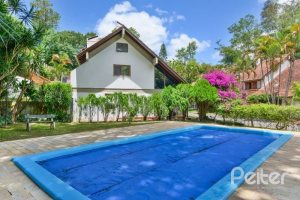 Casa em Condomínio à venda com 220m², 5 dormitórios, 2 suítes, 2 vagas, no bairro Ipanema em Porto Alegre