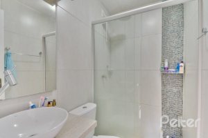 Casa em Condomínio à venda com 220m², 5 dormitórios, 2 suítes, 2 vagas, no bairro Ipanema em Porto Alegre