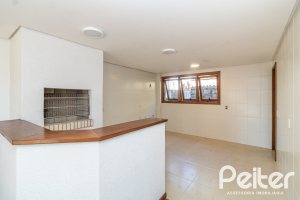 Casa à venda com 240m², 3 dormitórios, 1 suíte, 4 vagas, no bairro Vila Conceição em Porto Alegre