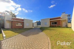 Casa em Condomínio à venda com 123m², 3 dormitórios, 1 suíte, 2 vagas, no bairro Hípica em Porto Alegre