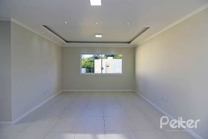 Casa em Condomínio à venda com 123m², 3 dormitórios, 1 suíte, 2 vagas, no bairro Hípica em Porto Alegre
