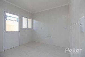 Casa em Condomínio à venda com 123m², 3 dormitórios, 1 suíte, 2 vagas, no bairro Hípica em Porto Alegre