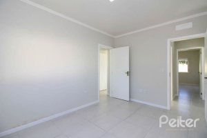 Casa em Condomínio à venda com 123m², 3 dormitórios, 1 suíte, 2 vagas, no bairro Hípica em Porto Alegre