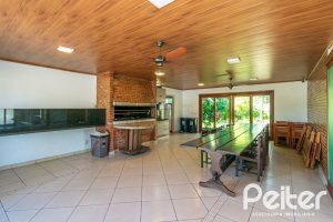 Casa em Condomínio à venda com 229m², 3 dormitórios, 1 suíte, 3 vagas, no bairro Tristeza em Porto Alegre