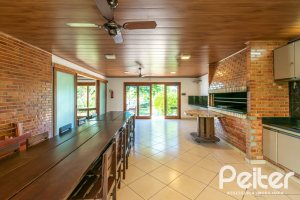 Casa em Condomínio à venda com 229m², 3 dormitórios, 1 suíte, 3 vagas, no bairro Tristeza em Porto Alegre