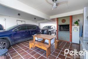 Casa em Condomínio à venda com 229m², 3 dormitórios, 1 suíte, 3 vagas, no bairro Tristeza em Porto Alegre