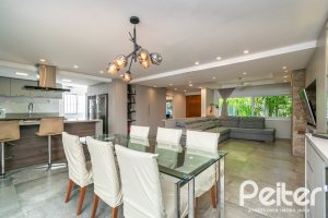 Casa em Condomínio à venda com 229m², 3 dormitórios, 1 suíte, 3 vagas, no bairro Tristeza em Porto Alegre