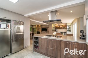 Casa em Condomínio à venda com 229m², 3 dormitórios, 1 suíte, 3 vagas, no bairro Tristeza em Porto Alegre