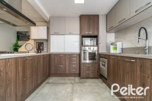 Casa em Condomínio à venda com 229m², 3 dormitórios, 1 suíte, 3 vagas, no bairro Tristeza em Porto Alegre