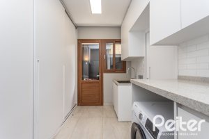 Casa em Condomínio à venda com 608m², 5 dormitórios, 5 suítes, 3 vagas, no bairro Terra Ville em PORTO ALEGRE