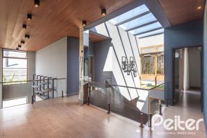 Casa em Condomínio à venda com 608m², 5 dormitórios, 5 suítes, 3 vagas, no bairro Terra Ville em PORTO ALEGRE