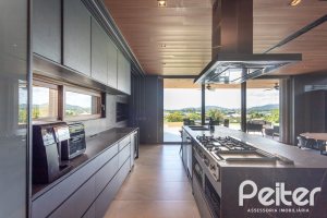 Casa em Condomínio à venda com 608m², 5 dormitórios, 5 suítes, 3 vagas, no bairro Terra Ville em PORTO ALEGRE