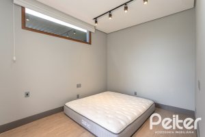 Casa em Condomínio à venda com 608m², 5 dormitórios, 5 suítes, 3 vagas, no bairro Terra Ville em PORTO ALEGRE