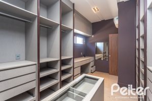 Casa em Condomínio à venda com 608m², 5 dormitórios, 5 suítes, 3 vagas, no bairro Terra Ville em PORTO ALEGRE