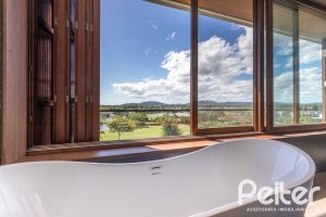 Casa em Condomínio à venda com 608m², 5 dormitórios, 5 suítes, 3 vagas, no bairro Terra Ville em PORTO ALEGRE