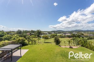 Casa em Condomínio à venda com 608m², 5 dormitórios, 5 suítes, 3 vagas, no bairro Terra Ville em PORTO ALEGRE
