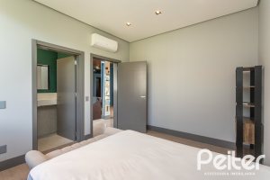 Casa em Condomínio à venda com 608m², 5 dormitórios, 5 suítes, 3 vagas, no bairro Terra Ville em PORTO ALEGRE