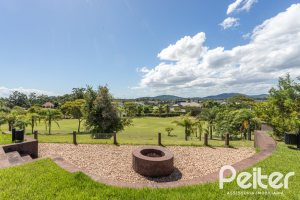 Casa em Condomínio à venda com 608m², 5 dormitórios, 5 suítes, 3 vagas, no bairro Terra Ville em PORTO ALEGRE