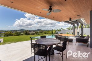 Casa em Condomínio à venda com 608m², 5 dormitórios, 5 suítes, 3 vagas, no bairro Terra Ville em PORTO ALEGRE