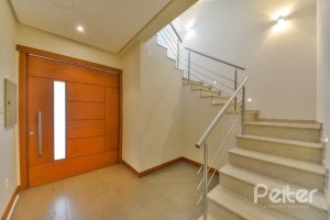 Casa em Condomínio à venda com 397m², 4 dormitórios, 4 suítes, 3 vagas, no bairro Vila Conceicao em PORTO ALEGRE