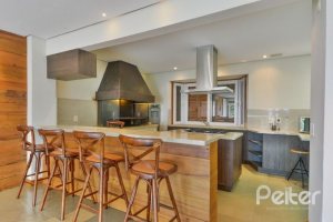 Casa em Condomínio à venda com 397m², 4 dormitórios, 4 suítes, 3 vagas, no bairro Vila Conceicao em PORTO ALEGRE