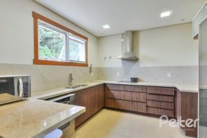 Casa em Condomínio à venda com 397m², 4 dormitórios, 4 suítes, 3 vagas, no bairro Vila Conceicao em PORTO ALEGRE