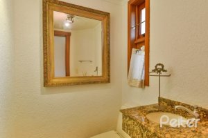 Casa em Condomínio à venda com 245m², 3 dormitórios, 1 suíte, 3 vagas, no bairro Vila Assunção em Porto Alegre