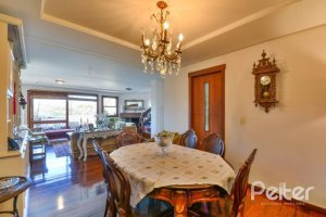 Casa em Condomínio à venda com 245m², 3 dormitórios, 1 suíte, 3 vagas, no bairro Vila Assunção em Porto Alegre