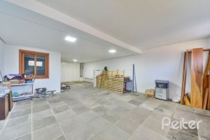 Casa em Condomínio à venda com 245m², 3 dormitórios, 1 suíte, 3 vagas, no bairro Vila Assunção em Porto Alegre