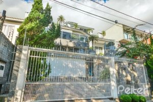 Casa à venda com 399m², 3 dormitórios, 3 suítes, 4 vagas, no bairro Nonoai em Porto Alegre