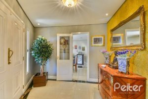 Casa à venda com 399m², 3 dormitórios, 3 suítes, 4 vagas, no bairro Nonoai em Porto Alegre