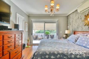 Casa à venda com 399m², 3 dormitórios, 3 suítes, 4 vagas, no bairro Nonoai em Porto Alegre