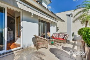 Casa à venda com 399m², 3 dormitórios, 3 suítes, 4 vagas, no bairro Nonoai em Porto Alegre