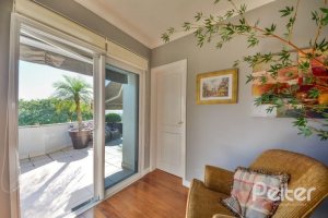 Casa à venda com 399m², 3 dormitórios, 3 suítes, 4 vagas, no bairro Nonoai em Porto Alegre