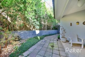 Casa à venda com 399m², 3 dormitórios, 3 suítes, 4 vagas, no bairro Nonoai em Porto Alegre