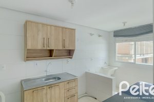 Apartamento à venda com 65m², 2 dormitórios, 1 suíte, 1 vaga, no bairro Camaquã em Porto Alegre