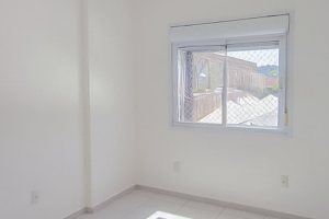 Apartamento à venda com 65m², 2 dormitórios, 1 suíte, 1 vaga, no bairro Camaquã em Porto Alegre