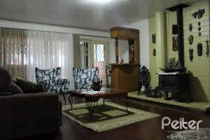 Casa à venda com 354m², 3 dormitórios, 2 suítes, 4 vagas, no bairro Ipanema em Porto Alegre
