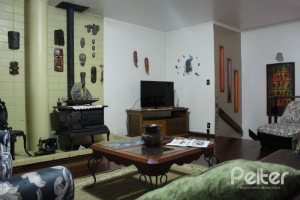 Casa à venda com 354m², 3 dormitórios, 2 suítes, 4 vagas, no bairro Ipanema em Porto Alegre