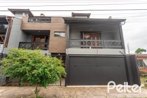 Casa à venda com 240m², 3 dormitórios, 1 suíte, 2 vagas, no bairro Ipanema em Porto Alegre