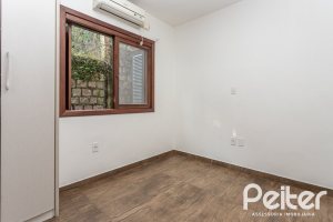 Casa em Condomínio à venda com 135m², 2 dormitórios, 1 suíte, 2 vagas, no bairro Tristeza em PORTO ALEGRE