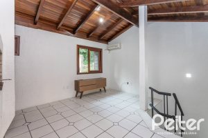 Casa em Condomínio à venda com 135m², 2 dormitórios, 1 suíte, 2 vagas, no bairro Tristeza em PORTO ALEGRE