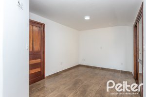 Casa em Condomínio à venda com 135m², 2 dormitórios, 1 suíte, 2 vagas, no bairro Tristeza em PORTO ALEGRE