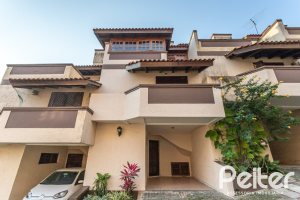 Casa em Condomínio à venda com 135m², 2 dormitórios, 1 suíte, 2 vagas, no bairro Tristeza em PORTO ALEGRE
