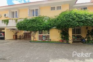 Casa em Condomínio à venda com 191m², 4 dormitórios, 2 suítes, 2 vagas, no bairro Jardim Isabel em Porto Alegre