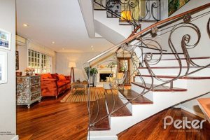 Casa em Condomínio à venda com 191m², 4 dormitórios, 2 suítes, 2 vagas, no bairro Jardim Isabel em Porto Alegre