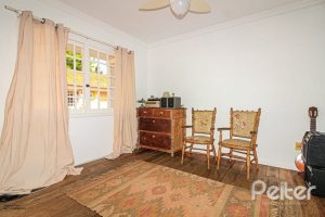 Casa em Condomínio à venda com 191m², 4 dormitórios, 2 suítes, 2 vagas, no bairro Jardim Isabel em Porto Alegre