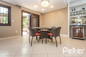 Casa em Condomínio à venda com 275m², 3 dormitórios, 1 suíte, 2 vagas, no bairro Tristeza em Porto Alegre