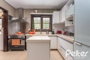 Casa em Condomínio à venda com 275m², 3 dormitórios, 1 suíte, 2 vagas, no bairro Tristeza em Porto Alegre